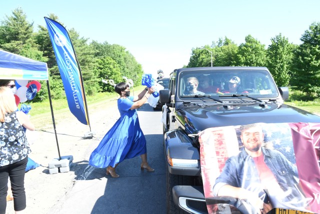 An outpouring of support stretched for miles as Fort Drum community members celebrated Class of 2020 graduates June 18 with a commencement parade. Dozens of high school seniors and their family members drove across post in vehicles decorated with...