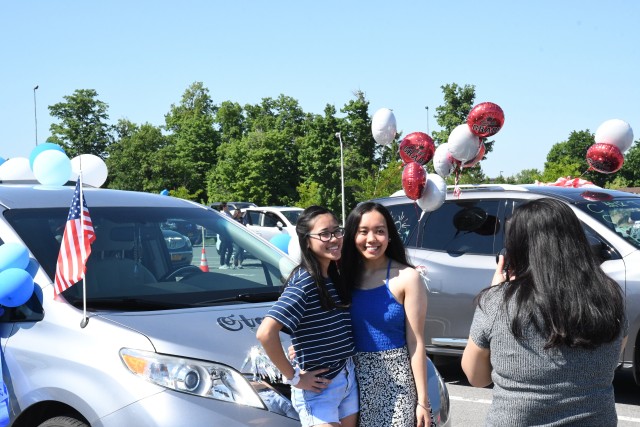 An outpouring of support stretched for miles as Fort Drum community members celebrated Class of 2020 graduates June 18 with a commencement parade. Dozens of high school seniors and their family members drove across post in vehicles decorated with...