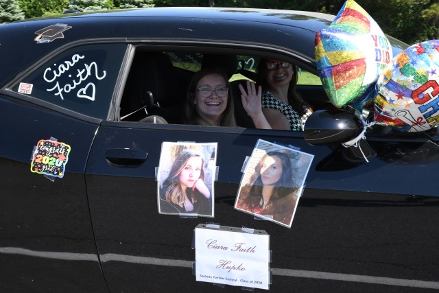 An outpouring of support stretched for miles as Fort Drum community members celebrated Class of 2020 graduates June 18 with a commencement parade. Dozens of high school seniors and their family members drove across post in vehicles decorated with...