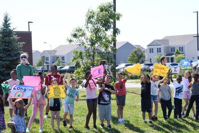 An outpouring of support stretched for miles as Fort Drum community members celebrated Class of 2020 graduates June 18 with a commencement parade. Dozens of high school seniors and their family members drove across post in vehicles decorated with...