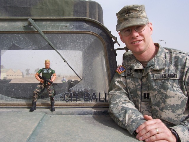 Bosnia Bob takes a break with Chaplain Lt. Col. Douglas Ball II by their Humvee during their deployment to Iraq in February 2006.  Bob is the traveling companion of 1st Armored Division Chaplain Lt. Col. Douglas Ball II. Photos with Bob over their 17 years and six deployments together helped make the separation more lighthearted for Ball’s children.