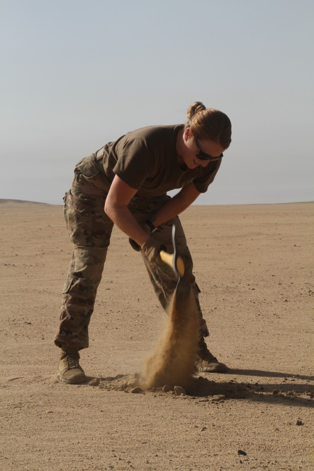 U.S. Army Soldiers with the 741st Ordnance Battalion conduct explosives training in the CENTCOM area of responsibility, June 9, 2020. Soldiers were digging holes in preparation of a live fire training exercise. (U.S. Army photo by Sgt. Andrew Valenza)