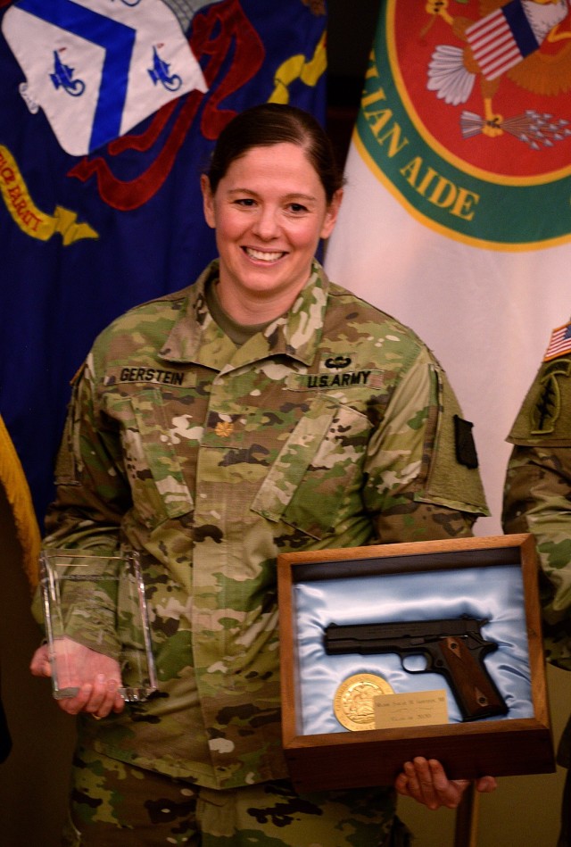 Maj. Sarah Gerstein is the 2020 recipient of the General George C. Marshall Award, which recognizes the most distinguished U.S. graduate in each Command and General Staff Officer Course class. CGSOC award recipients received their awards in a small ceremony June 11 in Marshall Lecture Hall at the Lewis and Clark Center. The 2020 CGSOC graduation and international badge ceremonies were conducted virtually on Facebook and YouTube, with videos of pre-recorded speeches, photos of award recipients and names of graduates listed. Photo by Prudence Siebert/Fort Leavenworth Lamp
