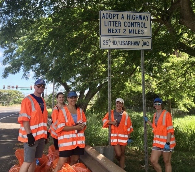 Service members assigned to the 25th Infantry Division pose for a photo in front of their unit’s “Adopt-A-Highway” sign in Haleiwa, Hawaii on the island of Oahu on June 15, 2020. These Soldiers conduct a quarterly clean-up along a two-mile stretch of Kamehameha Highway on the North Shore of Oahu (U.S. Army photo by Capt. Cora Allen)