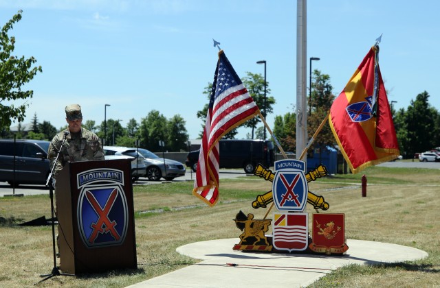 Col. Jason Williams, 10th Mountain Division (LI) Artillery commander, speaks to attendees at a rededication ceremony at Fort Drum, N.Y., June 19, 2020.  The DIVARTY headquarters building was renamed to Ruffner Hall after Maj. Gen. David L. Ruffner, the commander of the unit during WWII. (U.S. Army photo by Pfc. Anastasia Rakowsky)