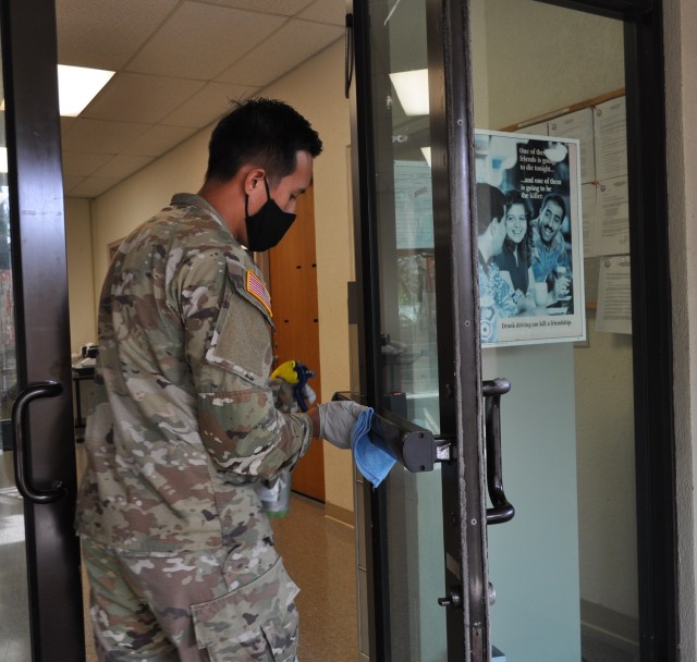 Spc. Felmar Capundag, Supply Specialist assigned to the 100th Infantry Battalion, mobilized to assist the COVID-19 Cleaning Team to ensure immediate and routine proactive cleaning and disinfecting measures are applied throughout the 9th MSC Area of Responsibility.
