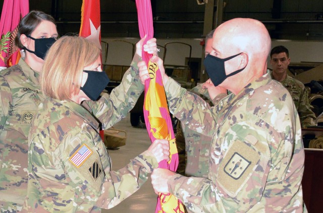 FORT LEE, VA. -- Brig. Gen. Michelle M. T. Lechter takes the Ordnance Corps colors from Maj. Gen. Rodney D. Fogg, CASCOM and Fort Lee commanding general, during an Assumption of Command ceremony June 16  at the Ordnance Training Support Facility.