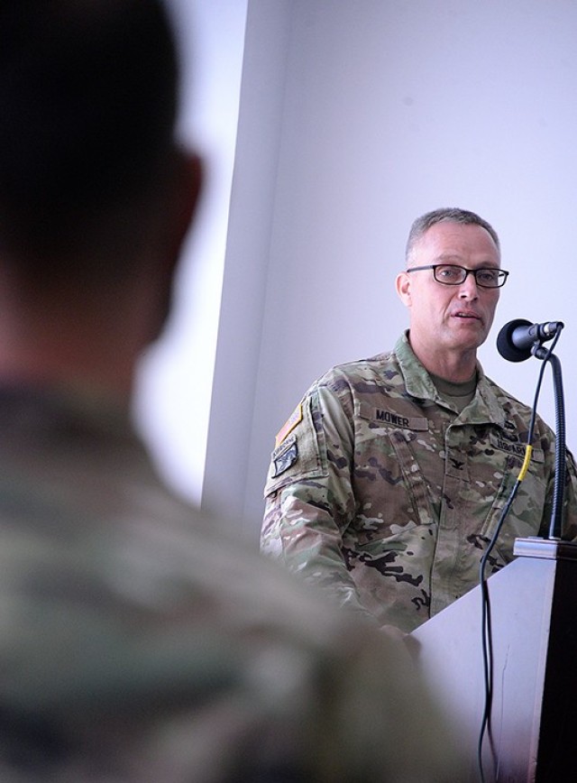 Outgoing Medical Department Activity and Munson Army Health Center Commander Col. Scott Mower addresses incoming MEDDAC and MAHC Commander Col. Garrick Cramer, a few present guests and ceremony participants, and viewers online during the change of command between Mower and Cramer June 24 at MAHC. The ceremony was broadcast live on Facebook and only attended by a few people to adhere to COVID-19 precautions and social distancing guidelines. Photo by Prudence Siebert/Fort Leavenworth Lamp