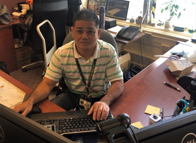 NAHA MILITARY PORT, NAHA, OKINAWA - (June 5, 2020) Yutaka “Tak” Kakazu, an Information Technology Specialist at the 835th Transportation Battalion, combines his long experience and technical expertise to ensure the command's essential...