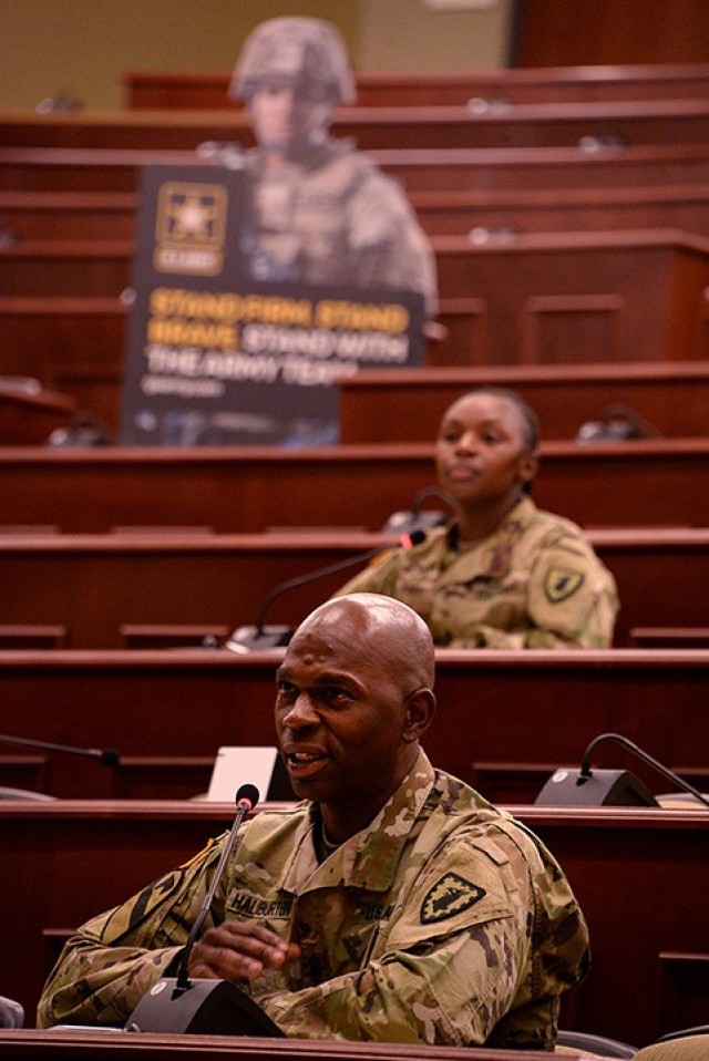 National Hiring Days panelist 40th Military Police Battalion (Detention) Command Sgt. Maj. Mark Haliburton talks about some of his rewarding jobs in the Army, including that of drill sergeant, during the recruitment-focused panel June 23 in Marshall Lecture Hall at the Lewis and Clark Center. Haliburton was joined by Sgt. Jellisa Shontelle Jones, human resources specialist, Headquarters and Headquarters Company, 40th MP Battalion, and four other panelists. Photo by Prudence Siebert/Fort Leavenworth Lamp