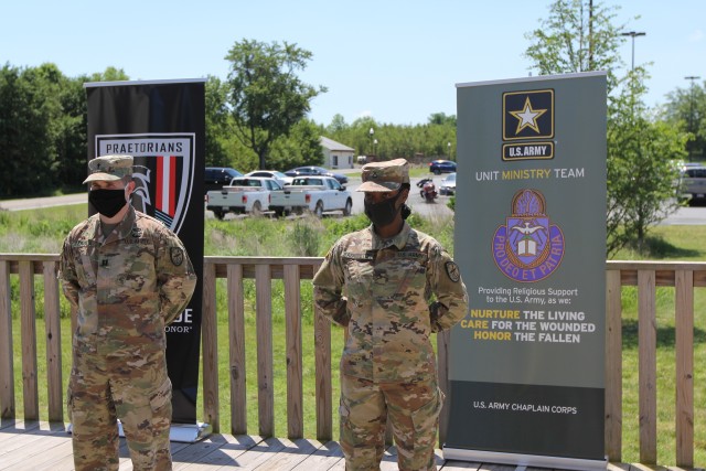 FORT GEORGE G. MEADE, Md. – Chap. (Capt.) Michael Cerula (left), the 781st Military Intelligence (MI) Battalion (Cyber) chaplain, and Pfc. Nakoya Washington, the battalion’s religious affairs specialist, were recognized by U.S. Army...