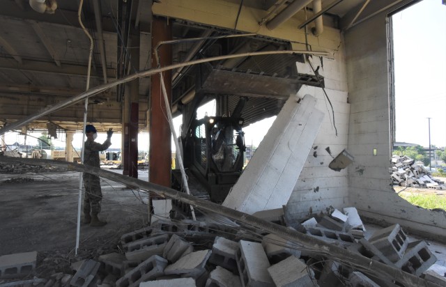 502nd Bridge Company demolishes two buildings to make space for equipment