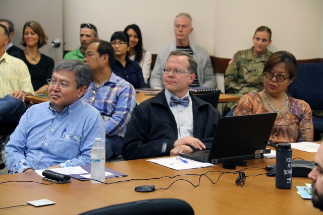 Rex W. Mols (center) was chosen as the 2020 Project Manager of the Year.