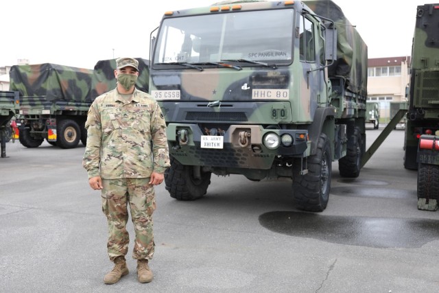 Sgt. Kalil Knight, a wheeled vehicle mechanic assigned to the 35th Combat Sustainment Support Battalion, poses for a photo May 20 at the Transportation Motor Pool on Camp Zama, Japan.