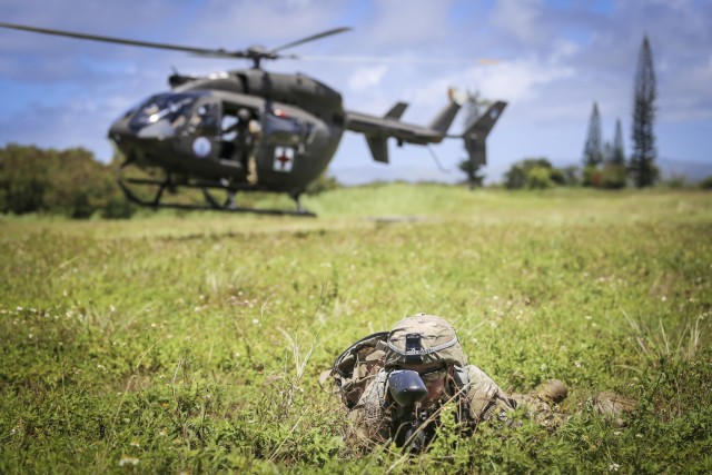 Officer candidates from the Guam National Guard, and ROTC Cadets from the University of Guam, train together in Barrigada on June 17. The joint exercises mark the first coordinated training effort between the two commissioning sources in over 10...