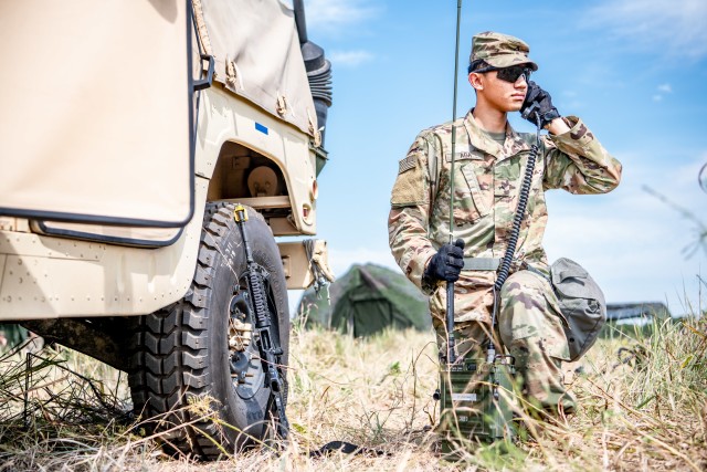 Pvt. Pona Aga, a signal support specialist assigned to 258th Network Support Company, “Superior Voices,” 100th Brigade Support Battalion, 75th Field Artillery Brigade, Fort Sill, Oklahoma, prepares a high frequency radio system during the...
