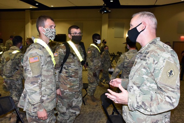 Maj. Gen. Dennis LeMaster, Commander, U.S. Army Medical Center of Excellence, speaks to AIT soldiers during the MEDCoE Army National Hiring Days Soldier Forum on June 26, 2020 at Joint Base San Antonio-Fort Sam Houston, Texas. Spread out through...