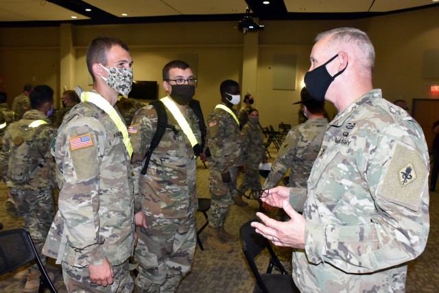 Maj. Gen. Dennis LeMaster, Commander, U.S. Army Medical Center of Excellence, speaks to AIT soldiers during the MEDCoE Army National Hiring Days Soldier Forum on June 26, 2020 at Joint Base San Antonio-Fort Sam Houston, Texas. Spread out through several sessions that adhere to COVID-19 countermeasures, the MEDCoE Army National Hiring Days Soldier Forum will reach nearly 600 Soldiers.