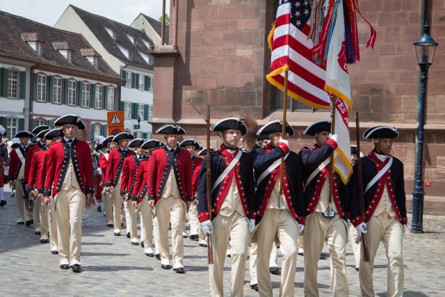 Soldiers with the 3d U.S. Infantry Regiment (The Old Guard), Fife and Drum Corps, and U.S. Army Continental Color Guard, participate in a parade in Basel, Switzerland, on July 22, 2017.