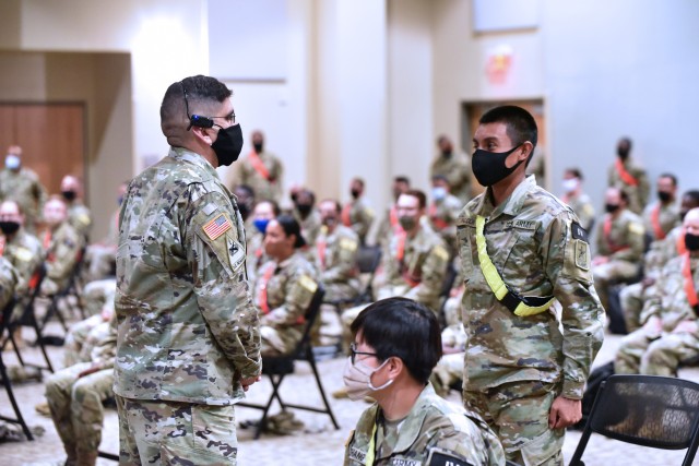 Col. Roman Cantu, 5th Recruiting Brigade, answers a Soldier's question during the MEDCoE Army National Hiring Days Soldier Forum on June 30, 2020 at Joint Base San Antonio-Fort Sam Houston, Texas. Spread out through several sessions that adhere to COVID-19 countermeasures, the MEDCoE Army National Hiring Days Soldier Forum reached nearly 600 soldiers.