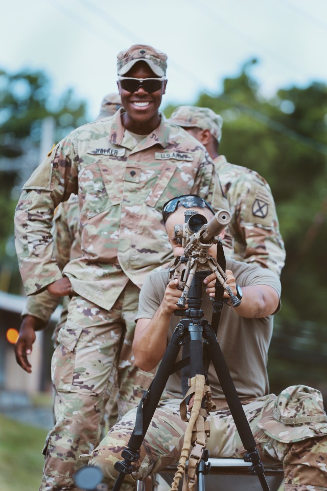 Scouts from 2-2 Infantry train on range finding and target accusation at Camp Natural Bridge.