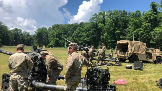 Bulldog Battery Soldiers from 3rd Brigade, 10th Mountain Division out of Fort Polk, La., get after training on preparing the howitzers for action. The Bulldog Battery is the 5-25 Field Artillery Regiment commanded by Capt. Jeremy Tomaino, and is...