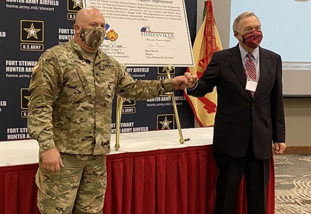 Fort Stewart Garrison Commander Col. Bryan Logan and City of Hinesville Mayor Allen Brown