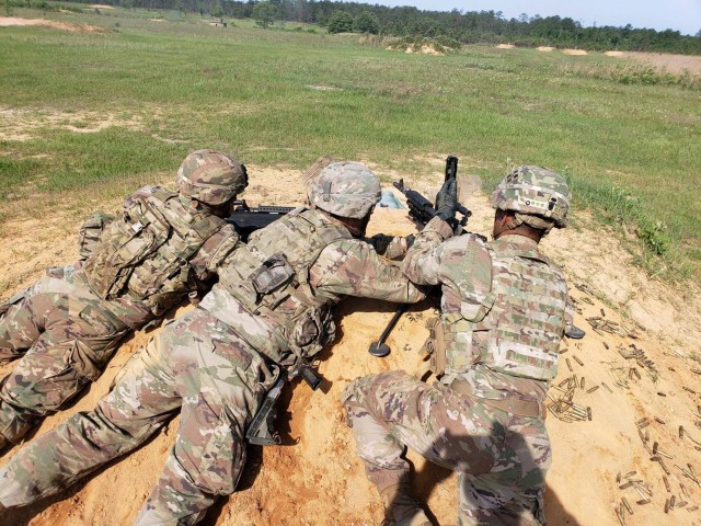 FORT BENNING, Ga. – In an August 2019 photo, Soldiers attending the Henry Caro Noncommissioned Officer Academy as students in its Infantry Advanced Leader Course take part in machine gun training in which students must maneuver their weapons...