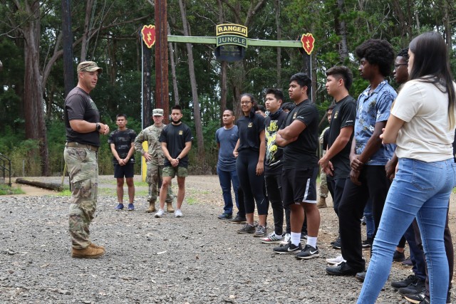 A group of future Soldiers learn what the 25th Infantry Division Lightning Academy has to offer during an event on Schofield Barracks, Hawaii in support of the Army National Hiring Days Campaign on June 30, 2020. The event had units from across the installation demonstrate current physical fitness routines, the utilization of the Engagement Skills Trainer, what the division Lightning Academy has to offer, and more. (U.S. Army photo by Staff Sgt. Alan Brutus)