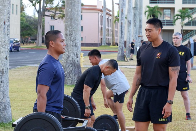 A group of future Soldiers take their turn performing deadlifts during an event on Schofield Barracks, Hawaii in support of the Army National Hiring Days Campaign on June 30, 2020. The event had units from across the installation demonstrate...
