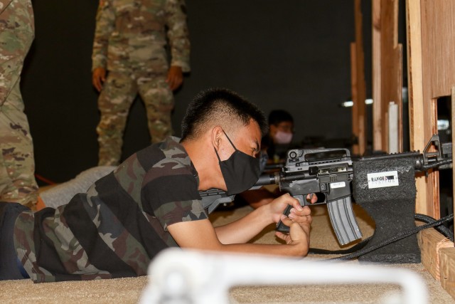 A group of future Soldiers take their turn using the Engagement Skills Training during an event on Schofield Barracks, Hawaii in support of the Army National Hiring Days Campaign on June 30, 2020. The event had units from across the installation...