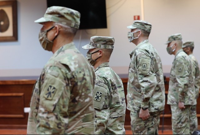 Leaders of the 11th and 108th Air Defense Artillery Brigade stand at attention as the Top Notch Brigade Transfer of Authority ceremony is about to commence at Al Udeid Air Base, Qatar, June 14, 2020.  The 11th ADA BDE assumed responsibility as the Top Notch Brigade from the 108th ADA BDE.