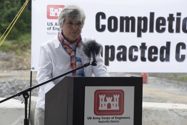 Patty Coffey, deputy district engineer for the U.S. Army Corps of Engineers Nashville District and master of ceremonies, welcomes guests July 1, 2020 to a ceremony celebrating the completion of the last phase of repairs for the $353 million Center Hill Dam Safety Rehabilitation Project. The U.S. Army Corps of Engineers Nashville District recently finished constructing a roller compacted concrete berm to reinforce the auxiliary dam at Center Hill Lake, a secondary earthen embankment that fills a low area in the landscape just east of the main dam. (USACE Photo by Leon Roberts)