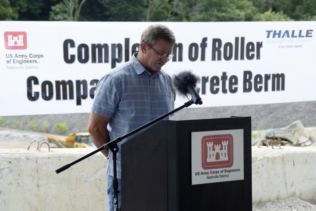 Corps of Engineers Retiree Tony Crow gives the invocation July 1, 2020 to a ceremony celebrating the completion of the last phase of repairs for the $353 million Center Hill Dam Safety Rehabilitation Project. The U.S. Army Corps of Engineers Nashville District recently finished constructing a roller compacted concrete berm to reinforce the auxiliary dam at Center Hill Lake, a secondary earthen embankment that fills a low area in the landscape just east of the main dam. (USACE Photo by Leon Roberts)