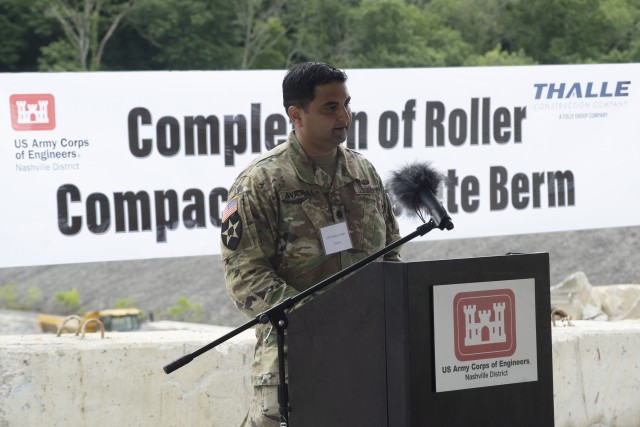 Lt. Col. Sonny Avichal, U.S. Army Corps of Engineers Nashville District commander, addresses guests at the Center Hill Lake Auxiliary Dam July 1, 2020 during a ceremony celebrating the completion of the last phase of repairs for the $353 million Center Hill Dam Safety Rehabilitation Project. The U.S. Army Corps of Engineers Nashville District recently finished constructing a roller compacted concrete berm to reinforce the auxiliary dam at Center Hill Lake, a secondary earthen embankment that fills a low area in the landscape just east of the main dam. (USACE Photo by Leon Roberts)