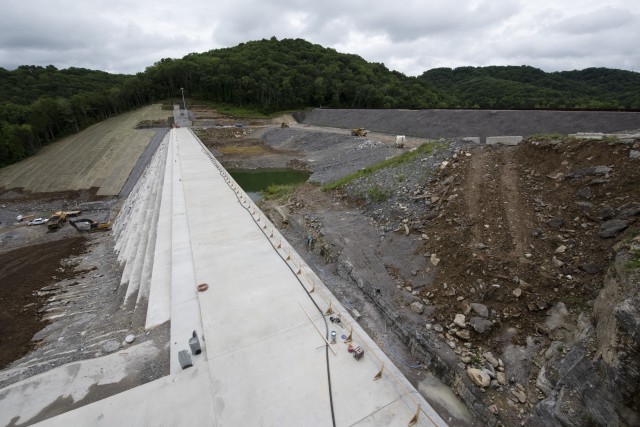 Officials held a ceremony July 1, 2020 to celebrate the completion of the last phase of repairs for the $353 million Center Hill Dam Safety Rehabilitation Project.  The U.S. Army Corps of Engineers Nashville District recently finished constructing a roller compacted concrete berm to reinforce the auxiliary dam at Center Hill Lake, a secondary earthen embankment that fills a low area in the landscape just east of the main dam. Construction of the $50 million RCC Berm completes the final major construction contract to remediate the Center Hill project. (USACE Photo by Leon Roberts)