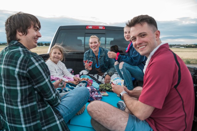 WIESBADEN, Germany - While waiting for the fireworks to commence, a family plays card games in the back of their pickup truck July 4, 2020, at Wiesbaden Army Airfield.