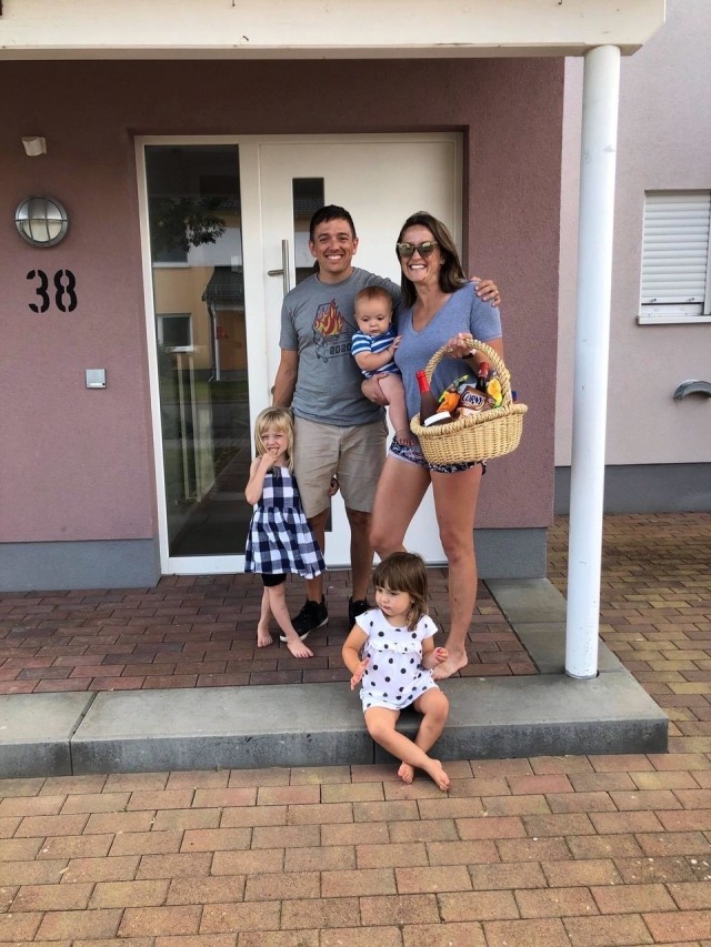 WIESBADEN, Germany - The North family stands on their front porch in Newman Village July 1, 2020. Ashley North is holding the basket provided by their sponsor family, the Schmitts. Photo provided by Christina Schmitt.