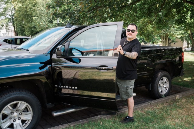 Staff Sgt. Rafael Marin stands with his truck July 1, 2020.