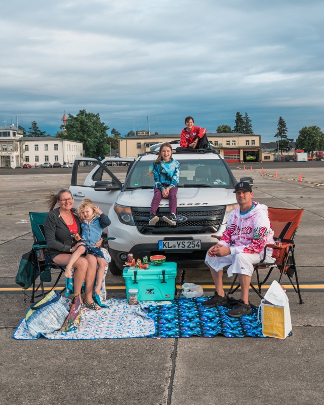 WIESBADEN, Germany - While waiting for the fireworks display to commence, a family enjoyed a car-side picnic, including fresh watermelon July 4, 2020, on Wiesbaden Army Airfield.
