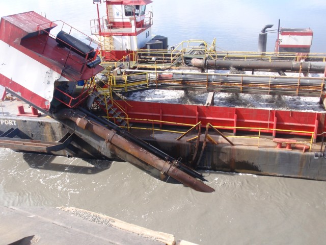 Sand, sediment and debris are removed from the seafloor by the Westport, a hopper dredge operated by Manson Construction, near the Port of Alaska on April 8, 2019. After dredging material is collected from the area near the docks, it is deposited 3,000 feet offshore, where the currents cannot bring it back to the harbor.