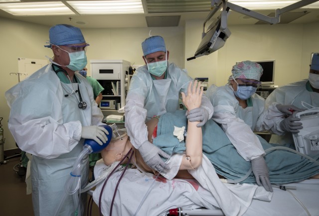 Members of the 555th Forward Surgical Team prepare a simulated trauma patient for surgery during training with the Strategic Trauma Readiness Center of San Antonio (STaRC) at Brooke Army Medical Center, Fort Sam Houston, Texas, May 28, 2020. The...