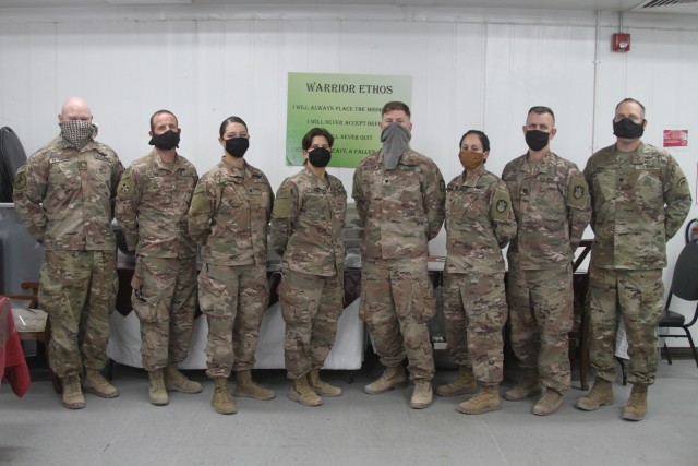 U.S. Army Soldiers from the Colorado National Guard's 117th Space Support Battalion, 1st Space Brigade, U.S. Army Space and Missile Defense Command, stand together following a badging ceremony, in CENTCOM's area of responsibility, June 26, 2020....