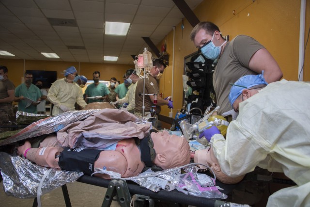 Members of the 555th Forward Surgical Team assess a simulated patient during training with Brooke Army Medical Center’s Strategic Trauma Readiness Center of San Antonio (STaRC) at Camp Bullis Military Training Reservation, Texas, May 26, 2020....