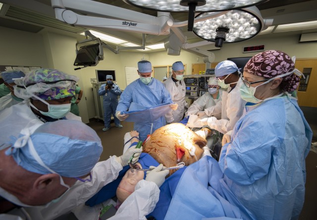 Members of the 555th Forward Surgical Team prepare a simulated trauma patient for surgery during training with the Strategic Trauma Readiness Center of San Antonio (STaRC) at Brooke Army Medical Center, Fort Sam Houston, Texas, May 28, 2020. The...