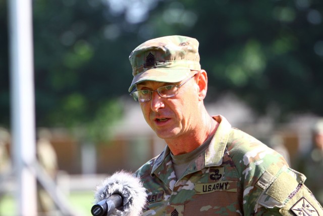 Fires Center of Excellence and Fort Sill Command Sgt. Maj. Stephen Burnley, addresses people attending the change of responsibility ceremony July 1, 2020, at the Old Post Quadrangle. Burnley previously served as the Air Defense Artillery command...