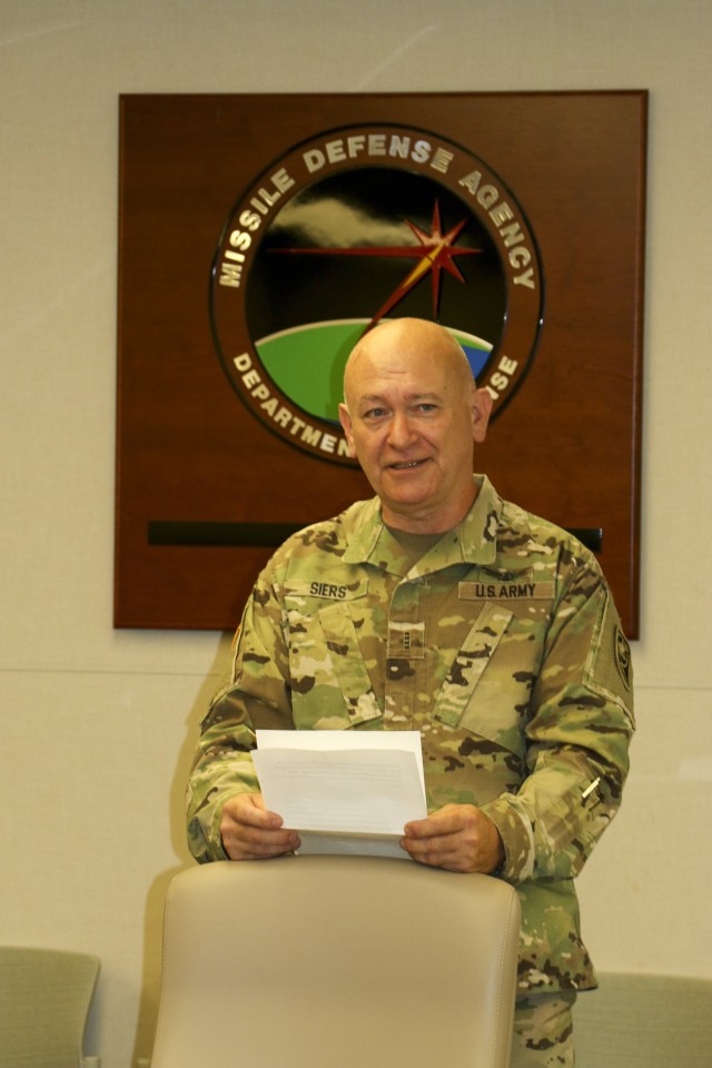 Chief Warrant Officer 4 Jon Siers, the senior command and control systems integrator for Detachment 1, 100th Missile Defense Brigade (Ground-based Midcourse Defense), delivers his remarks to a virtual audience during a farewell ceremony at the Missile Defense Agency Building at Vandenberg Air Force Base, Calif., July 8, 2020. Siers will officially retire later this year following a 35-year career in the U.S. Army. (U.S. Army photo by Staff Sgt. Zach Sheely)