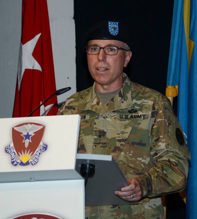 Brig. Gen. Mark Thompson delivers remarks during an assumption of command and assumption of responsibility ceremony July 9 at Kleber Kaserne, Germany.  Thompson took command of Regional Health Command Europe.