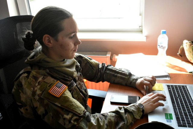 Spc. Kimberly Curtis, a unit supply specialist from Helena, Montana is completing administrative tasks for Drawsko Pomorskie Training area as a member of base camp mayor cell.  This mayor cell team is part of the 652nd Regional Support Group, a U.S. Army Reserve unit out of Helena, Montana. The RSG is responsible for providing life-sustaining operations on a military base. This includes every facet of Soldier life, from billeting to laundry and the dining facility.