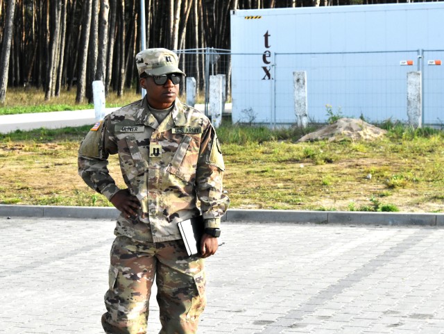 Capt. Jocelynn Oliver, a logistics officer from Atlanta, Georgia, is observing progess on Drawsko Pomorskie Training area.  Oliver and her team of seven Soldiers have taken charge in building up DPTA in preparation for current and future NATO exercises.  The team is part of the 652nd Regional Support Group, a U.S. Army Reserve unit out of Helena, Montana. The RSG is responsible for providing life-sustaining operations on a military base. This includes every facet of Soldier life, from billeting to laundry and the dining facility.